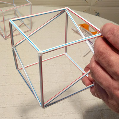 Estamos en casa: Construccin de una seccin rmbica del cubo. |matematicasVisuales