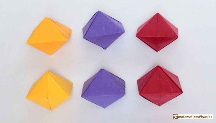 Cubo y dodecaedro rómbico, bipirámides con papel DinA, Michael Grodzins | matematicasvisuales