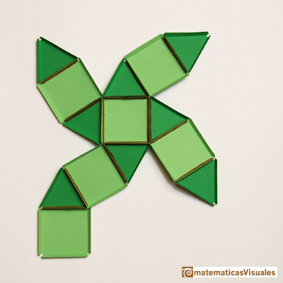 Volumen del cuboctaedro: desarrollo plano del cuboctaedro hecho con cartulina y gomas elásticas | matematicasvisuales
