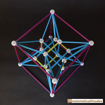 Piritoedro, dodecaedro irregular con caras pentagonales iguales: En el interior, doce vértices están en tres rectángulos áureos | matematicasVisuales