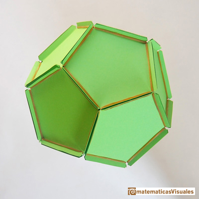 Dodecahedron plane net: plane net of a dodecahedron with rubber bands and paper | matematicasVisuales