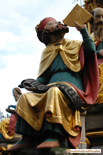 Volume of a cuboctahedron: Ptolemy in Schner Brunnen (The Beautiful Fountain) in Nuremberg (Germany, 2014) | matematicasvisuales